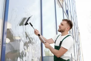 Cleaning window with a Window Wiper Squeegee Cleaner